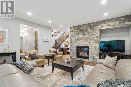 711 8Th Avenue N, Saskatoon, SK - Indoor Photo Showing Living Room With Fireplace