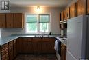 242 Cedar Avenue N, Eastend, SK  - Indoor Photo Showing Kitchen With Double Sink 