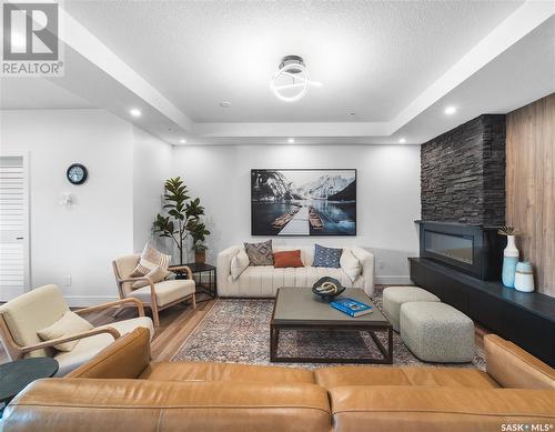 317 3581 Evans Court, Regina, SK - Indoor Photo Showing Living Room With Fireplace