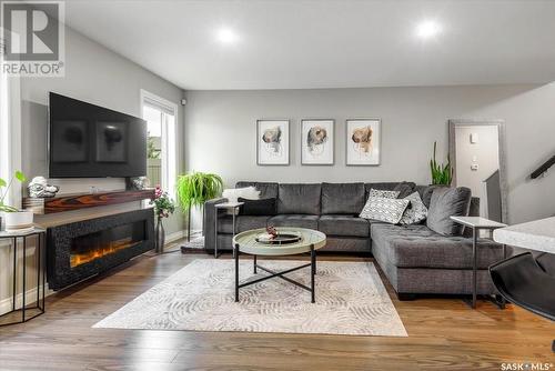 122 Demarco Pointe Lane, Regina, SK - Indoor Photo Showing Living Room With Fireplace