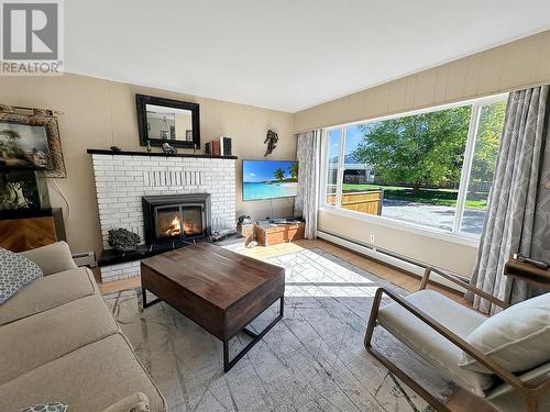 221 Fenchurch Avenue, Princeton, BC - Indoor Photo Showing Living Room With Fireplace