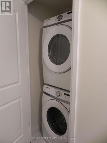 717 - 50 Thomas Riley Road, Toronto, ON - Indoor Photo Showing Laundry Room