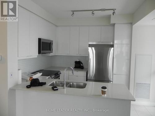 717 - 50 Thomas Riley Road, Toronto, ON - Indoor Photo Showing Kitchen With Double Sink