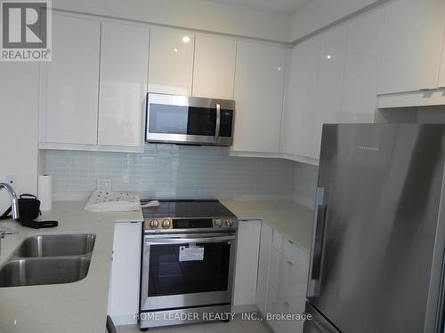 717 - 50 Thomas Riley Road, Toronto (Islington-City Centre West), ON - Indoor Photo Showing Kitchen With Double Sink