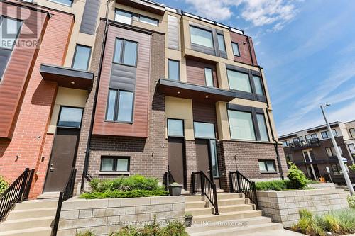 13 Caroline Carpenter Grove, Toronto (Downsview-Roding-Cfb), ON - Outdoor With Facade