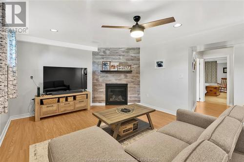 3672 Deerbrook, Windsor, ON - Indoor Photo Showing Living Room With Fireplace