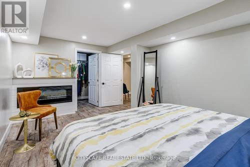 36 Telfer Court, Brant (Paris), ON - Indoor Photo Showing Bedroom With Fireplace