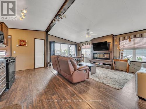 319 - 1501 Line 8 Road, Niagara-On-The-Lake (Queenston), ON - Indoor Photo Showing Other Room With Fireplace