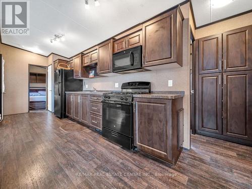 319 - 1501 Line 8 Road, Niagara-On-The-Lake (Queenston), ON - Indoor Photo Showing Kitchen