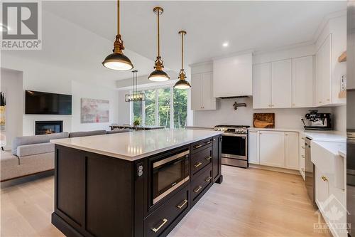 436 Cinnamon Crescent, Ottawa, ON - Indoor Photo Showing Kitchen With Fireplace