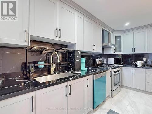 116 Redkey Drive, Markham, ON - Indoor Photo Showing Kitchen With Double Sink