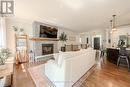 26 Wendat Trail, Springwater (Midhurst), ON  - Indoor Photo Showing Living Room With Fireplace 