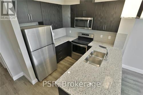 515 - 101 Locke Street S, Hamilton, ON - Indoor Photo Showing Kitchen With Double Sink With Upgraded Kitchen