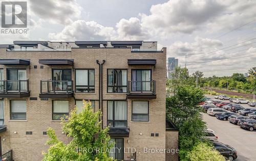 98 - 30 Fieldway Road, Toronto, ON - Outdoor With Balcony With Facade