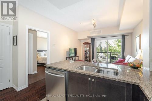 244 - 570 Lolita Gardens, Mississauga (Mississauga Valleys), ON - Indoor Photo Showing Kitchen With Double Sink