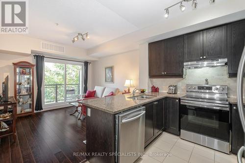 244 - 570 Lolita Gardens, Mississauga (Mississauga Valleys), ON - Indoor Photo Showing Kitchen With Double Sink