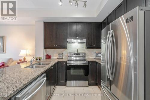 244 - 570 Lolita Gardens, Mississauga (Mississauga Valleys), ON - Indoor Photo Showing Kitchen With Stainless Steel Kitchen With Double Sink