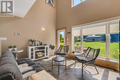 143 West Street, North Perth, ON - Indoor Photo Showing Living Room With Fireplace