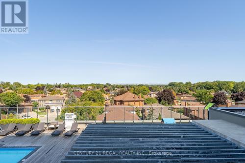 514 - 4800 Highway 7, Vaughan, ON - Outdoor With In Ground Pool