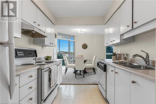 162 Martindale Road Unit# 405, St. Catharines, ON - Indoor Photo Showing Kitchen With Double Sink