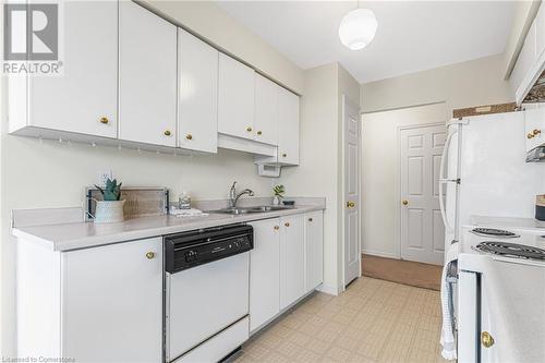 162 Martindale Road Unit# 405, St. Catharines, ON - Indoor Photo Showing Kitchen With Double Sink