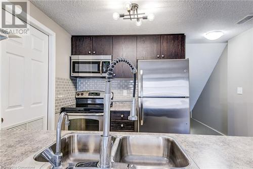 242 Rachel Crescent Unit# D, Kitchener, ON - Indoor Photo Showing Kitchen With Double Sink With Upgraded Kitchen