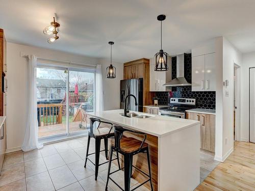 Kitchen - 4750 55E Avenue, Laval (Laval-Ouest), QC - Indoor Photo Showing Kitchen With Double Sink