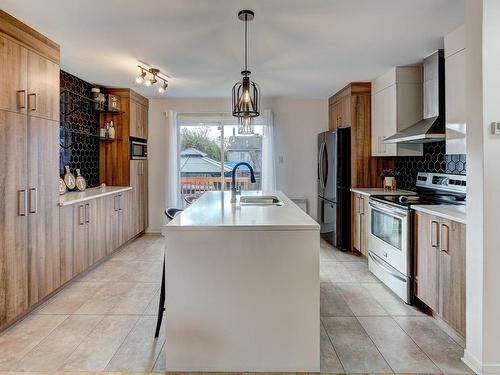 Kitchen - 4750 55E Avenue, Laval (Laval-Ouest), QC - Indoor Photo Showing Kitchen With Double Sink