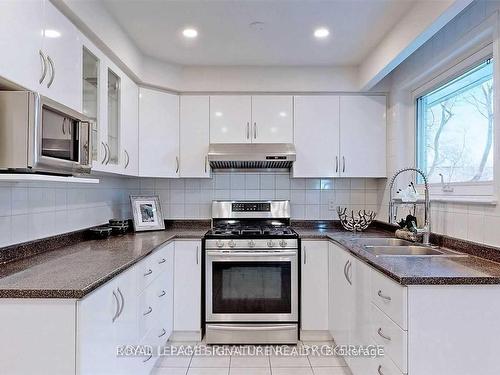 Upper-17 Baroness Cres, Toronto, ON - Indoor Photo Showing Kitchen With Double Sink