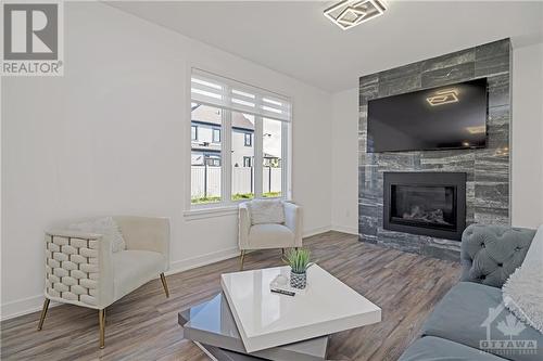 603 Noriker Court, Richmond, ON - Indoor Photo Showing Living Room With Fireplace