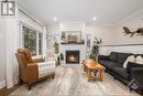 734 Powers Road, Tay Valley, ON  - Indoor Photo Showing Living Room With Fireplace 