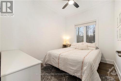 734 Powers Road, Tay Valley, ON - Indoor Photo Showing Bedroom