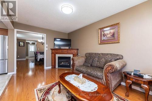 14 Passfield Trail, Brampton, ON - Indoor Photo Showing Living Room With Fireplace