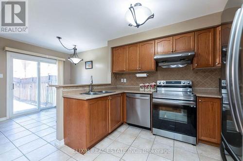 14 Passfield Trail, Brampton, ON - Indoor Photo Showing Kitchen With Double Sink