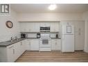 2080 Mountain View Avenue Unit# 120, Lumby, BC  - Indoor Photo Showing Kitchen With Double Sink 