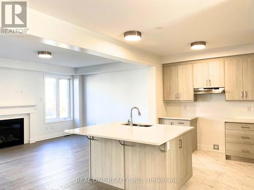 42 Misthollow Crescent, Markham, ON - Indoor Photo Showing Kitchen With Fireplace