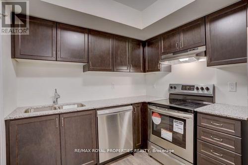 434 - 2789 Eglinton Avenue E, Toronto, ON - Indoor Photo Showing Kitchen With Stainless Steel Kitchen