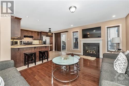 3121 Burritts Rapids Place, Ottawa, ON - Indoor Photo Showing Living Room With Fireplace