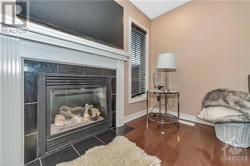 3121 Burritts Rapids Place, Ottawa, ON - Indoor Photo Showing Living Room With Fireplace