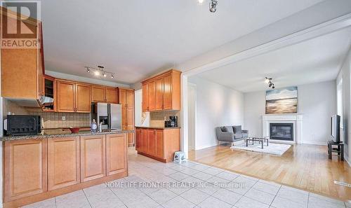 8 Campi Road, Vaughan, ON - Indoor Photo Showing Kitchen With Fireplace With Double Sink