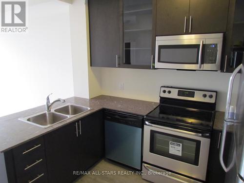 305 - 9500 Markham Road, Markham, ON - Indoor Photo Showing Kitchen With Stainless Steel Kitchen With Double Sink