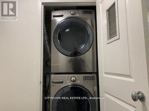 115 - 11 St Joseph Street, Toronto, ON - Indoor Photo Showing Laundry Room