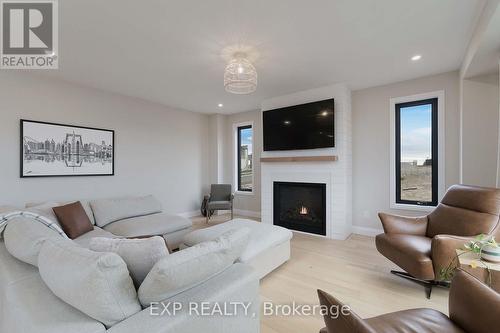 63 Gateway Drive, Barrie, ON - Indoor Photo Showing Living Room With Fireplace