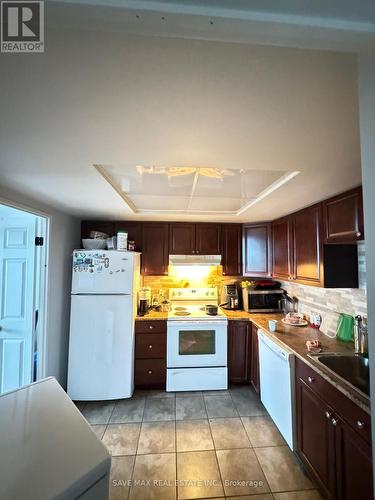 719 - 6 Humberline Drive, Toronto, ON - Indoor Photo Showing Kitchen