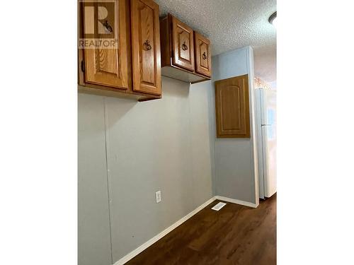 27 5701 Airport Drive, Fort Nelson, BC - Indoor Photo Showing Other Room