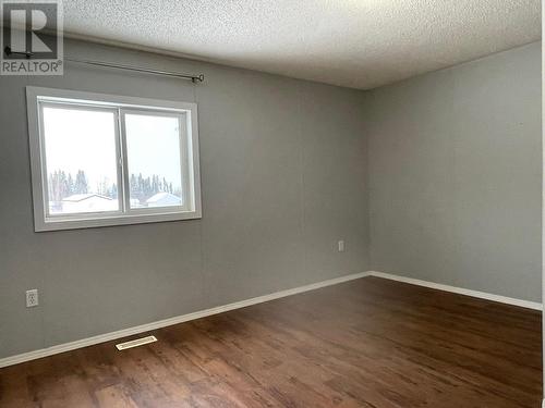 27 5701 Airport Drive, Fort Nelson, BC - Indoor Photo Showing Other Room