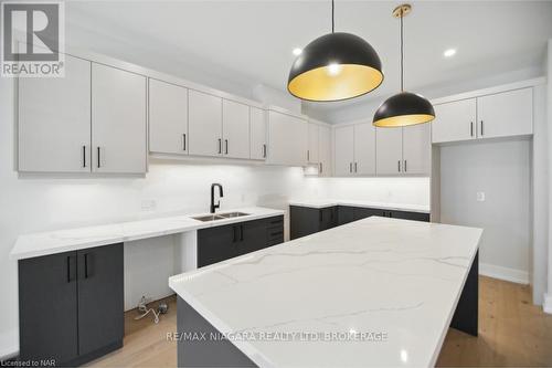 2 - 300 Richmond Street, Thorold (558 - Confederation Heights), ON - Indoor Photo Showing Kitchen With Double Sink