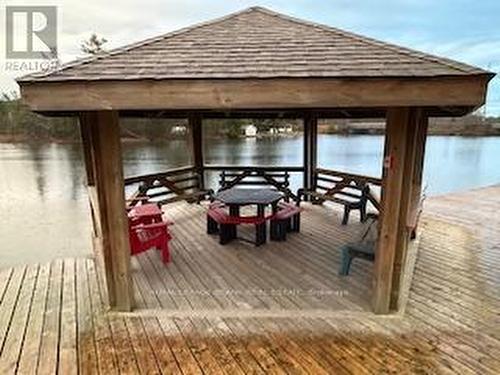 202 - 200 East Street S, Kawartha Lakes (Bobcaygeon), ON - Outdoor With Body Of Water With Deck Patio Veranda