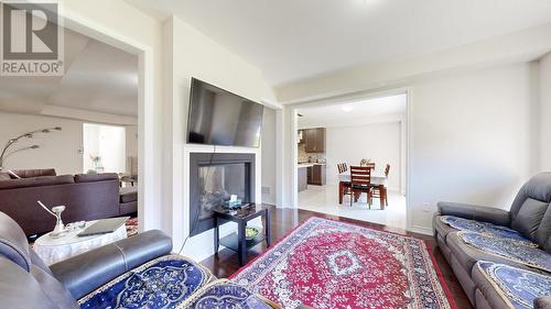 220 Fleetwood Drive, Oshawa, ON - Indoor Photo Showing Living Room With Fireplace