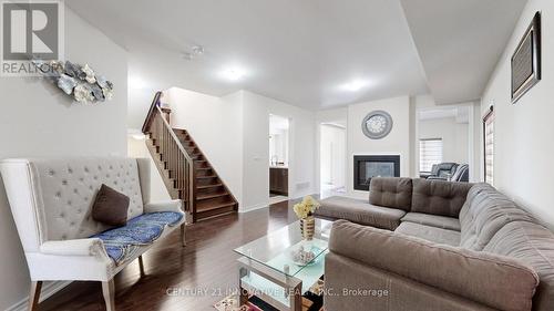 220 Fleetwood Drive, Oshawa, ON - Indoor Photo Showing Living Room With Fireplace